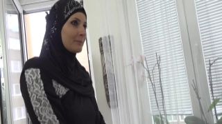 Hot Muslim woman doing extra cleaning